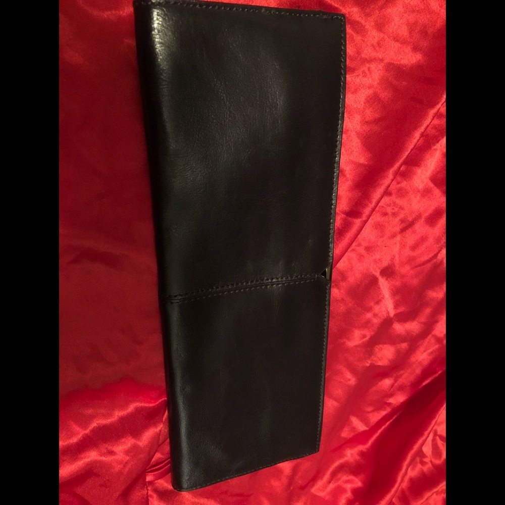 Dark purple leather clutch bag